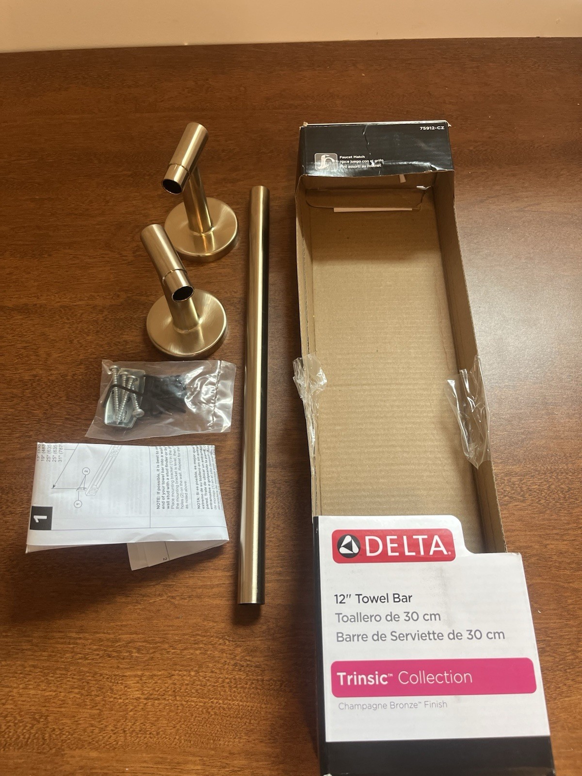 Delta 75912-CZ 12” Towel Bar Champagne Bronze Finish Trinsic