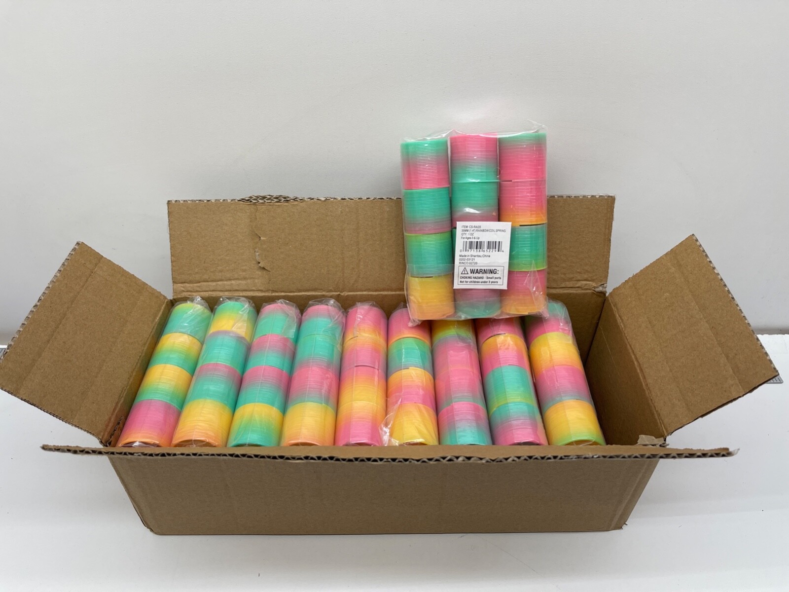 Rhode Island Novelty 1.4″ Rainbow Coil Spring Party Favors 120 Pack